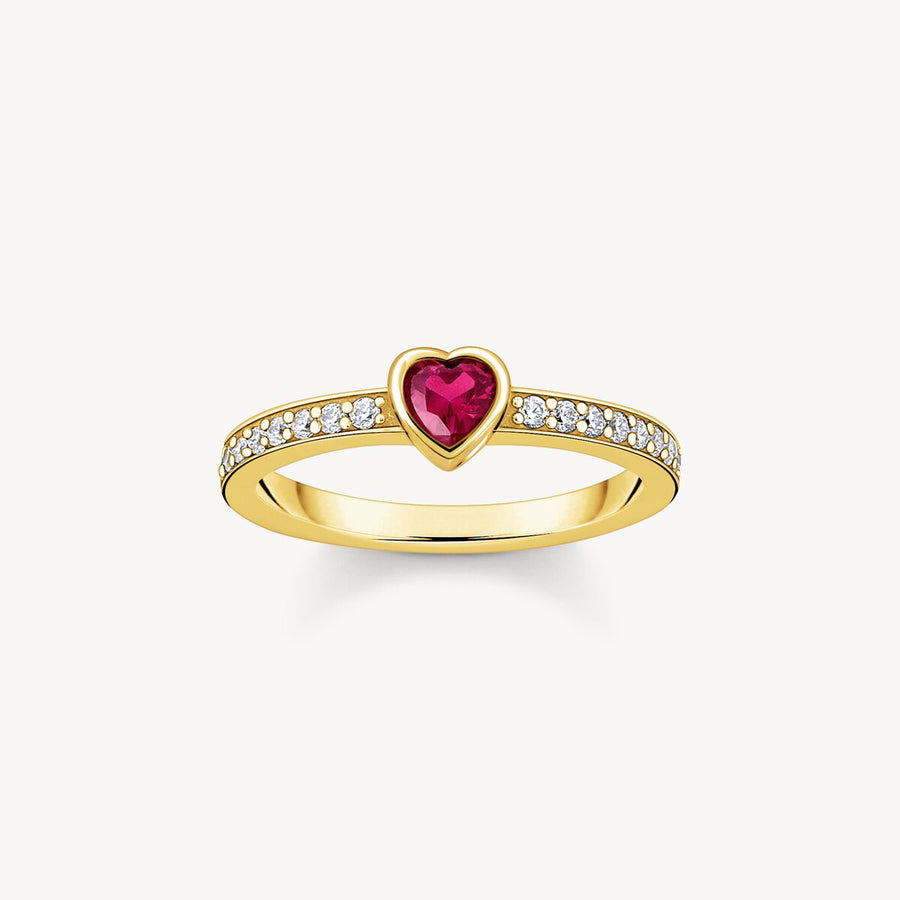 Gold-plated solitaire ring with red heart-shaped stone