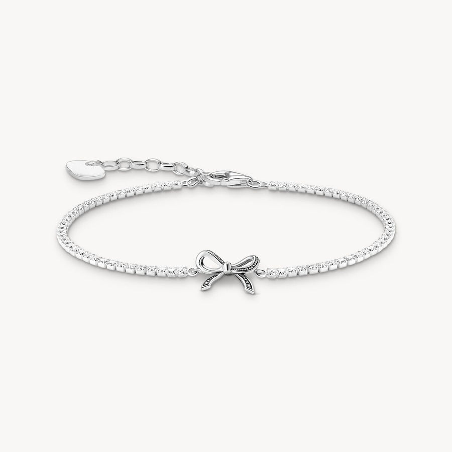 Silver bow bracelet with white zirconia