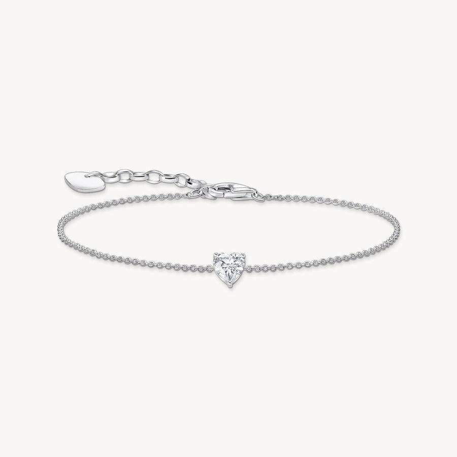 Silver bracelet with white heart-shaped pendant