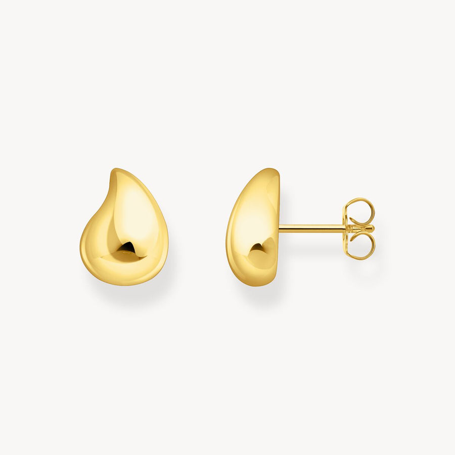 Small gold-plated ear studs in organic shape